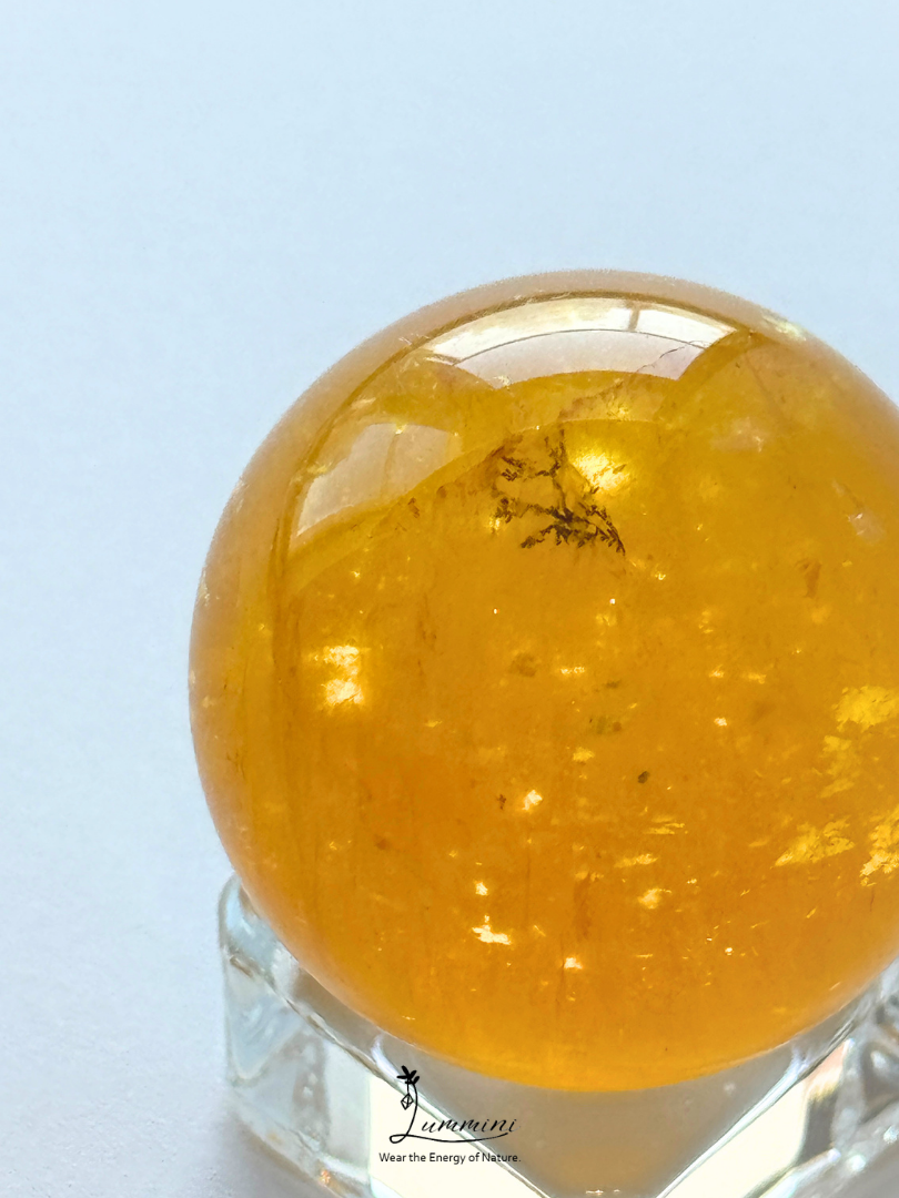 Natural Golden Fluorite Sphere with Dendritic Mineral Inclusion – 34mm