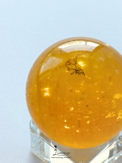 Natural Golden Fluorite Sphere with Dendritic Mineral Inclusion – 34mm