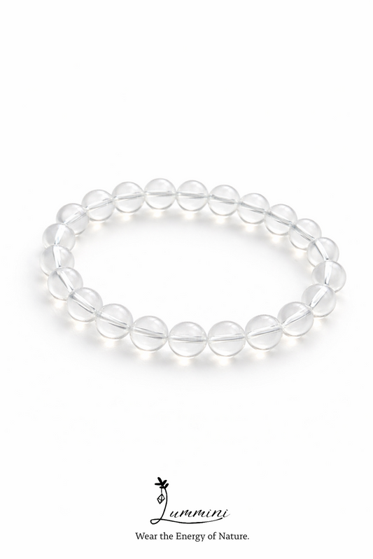 Clear beaded bracelet on a white background with 'Lummni' branding.